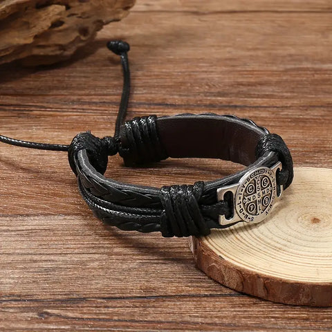 Image of PULSERA TRENZADA CRUZADA RETRO DE CUERO PARA HOMBRES